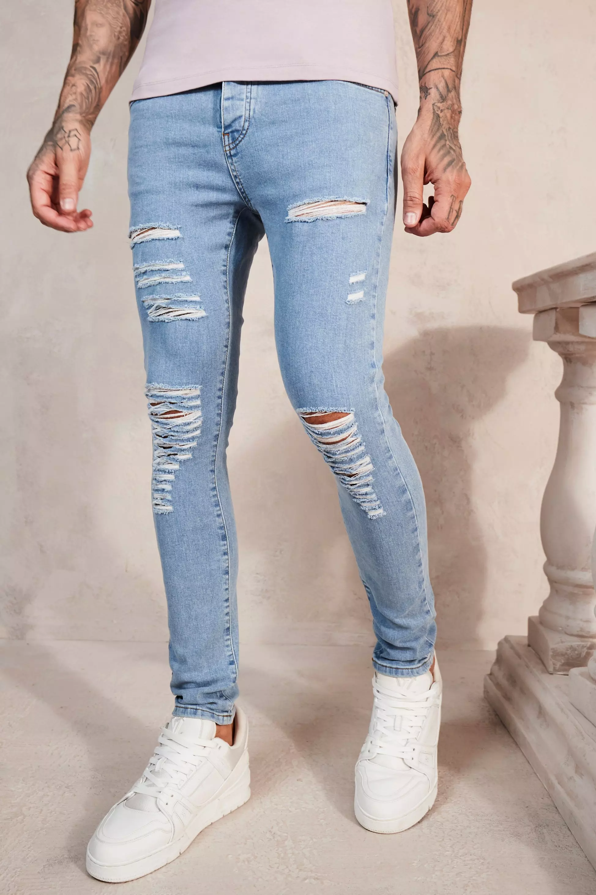 Super Skinny Jeans With All Over Rips | boohooMAN USA